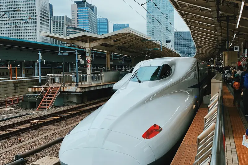 A Shinkansen bullet train waiting at a platform at Tokyo Station